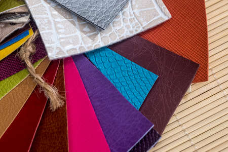 leather color sampler on wooden desk for design