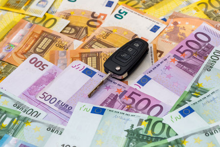 Remote car control on euro banknotes backgroundの写真素材