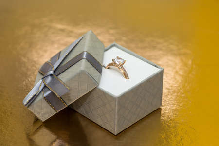 Beautiful golden ring as gift for valentine