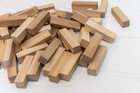 Wooden blocks for tower building on the desk