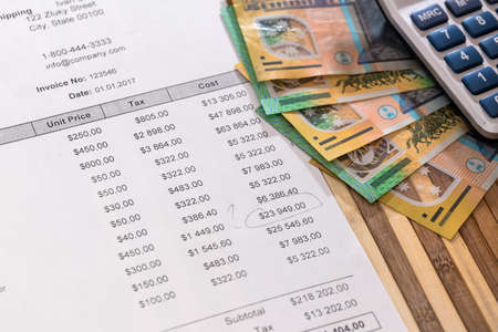 Purchasing order with australian dollar banknotes closeup