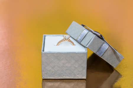 Beautiful golden ring as gift for valentine