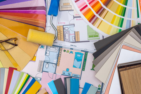 Construction concept: plan, color samples, roller