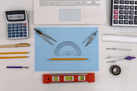 Engineer's workplace with millimeter paper and draw equipmentの写真素材