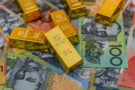 Ingot on colorful australian dollar banknotes closeupの写真素材