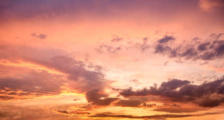 Clouds on sky in pink colors, sunset or sunriseの写真素材