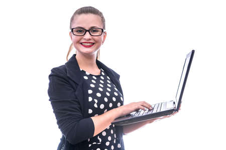 Young woman with laptop isolated on whiteの写真素材