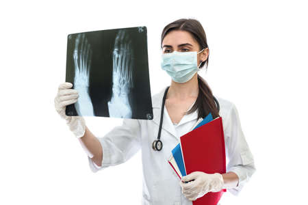 Doctor examining patient's x-ray of a foot