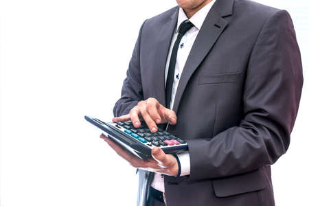 Man with calculator isolated on white backgroundの写真素材