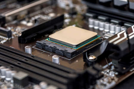 Motherboard with cpu chip on it close up
