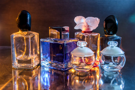 Collection of perfume bottles on dark backgroundの写真素材