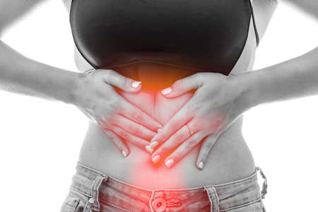 Female hands on belly. Pain in stomach or cycle's pain concept isolated