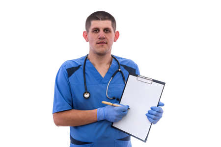 young doctor showing on clipboard isolated on white.の写真素材