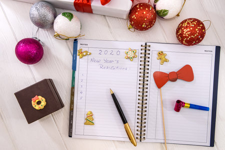 Notepad with new year presents and decorations