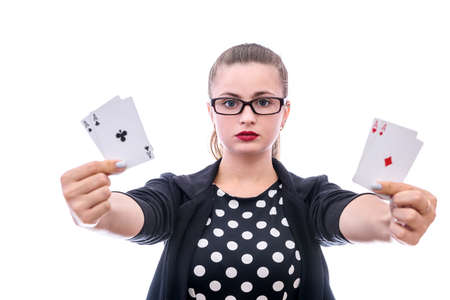 Young lady holding four aces isolated on white