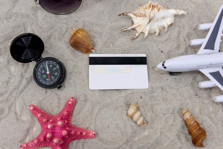 Passport, toy plane, dollar banknotes, traveling conceptの写真素材