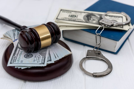 Selective focus on judge's gavel with american dollarsの写真素材