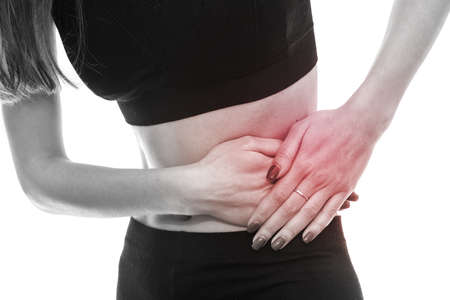 Hands on belly close up, ache concept
