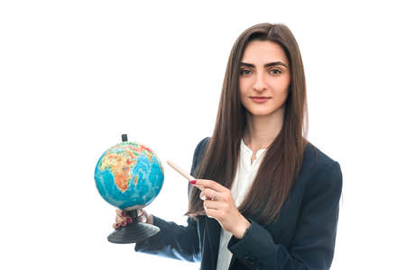 Young woman with globe in hat isolated on whiteの写真素材