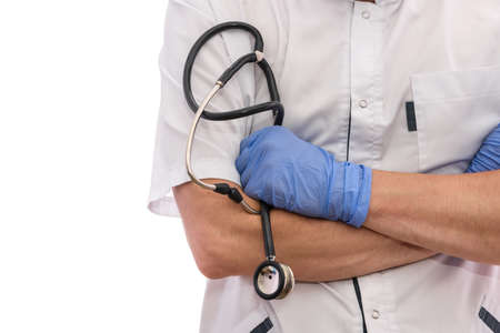 Male medical doctor in uniform with stethoscope isolated on white.の写真素材