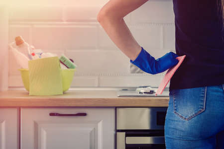 woman cleans in the kitchen. concept of cleanlinessの写真素材