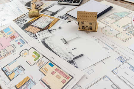 architect work - drawing sketch plans blueprints with color palette for help.の写真素材