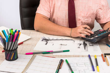 Engineer and architect concept - Designer creative working with sketch plan blueprint and color...