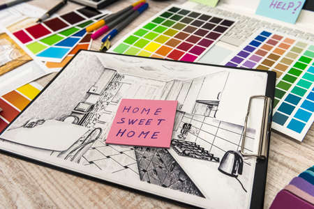 architect work - drawing sketch plans blueprints with color palette for help.の写真素材