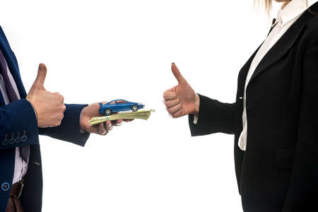 Successful business deal between partners for auto sales isolated on white background. Dollar....