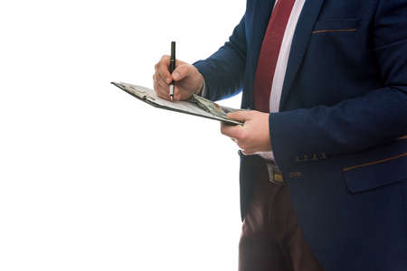businessman signs purchase or lease agreement or filling notepad isolated white background