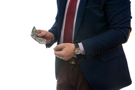 Successful businessman holding american dollar cash money isolated on white background