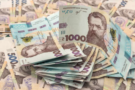 Background with Ukrainian money for design. UAH. New notes 500 and 1000. Concept of saving money