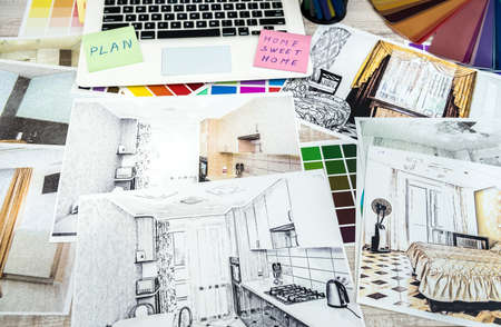 drawing modern home with sample material on creative desk, at office. House repair or decoration conceptの写真素材
