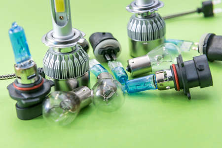 Electric car bulbs for headlight isolated on color background. Modern glass automotive lamp. Equipment for auto repairの写真素材