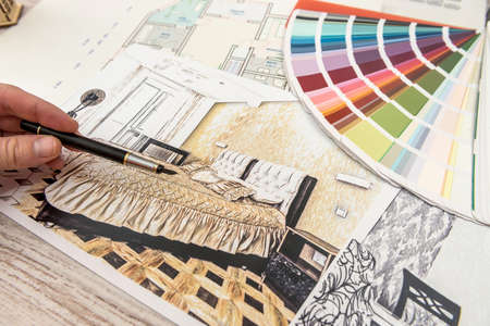 The designer chooses the perfect color for a new apartment. Sketch of a modern apartmentの写真素材