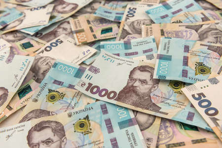 Background with Ukrainian money for design. UAH. New notes 500 and 1000. Concept of saving money