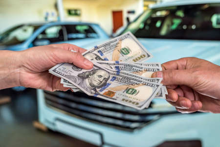 purchase new acr concept. man holding dollar for rent auto. finance
