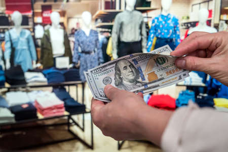 female buying fashion clothing at store. finance and lifestyle conceptsの写真素材