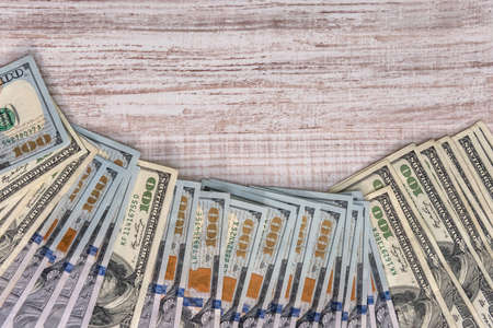 us dollar on wooden desk. clsoe up