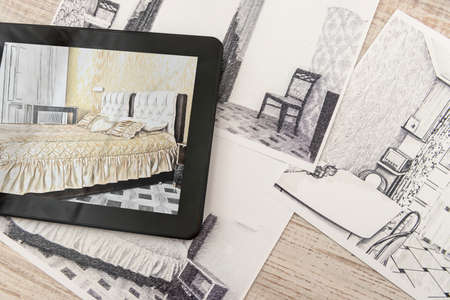 tablet showing bedroom plans in finished room. Modern apartment. Technical drawing. Home interior design, sketchの写真素材