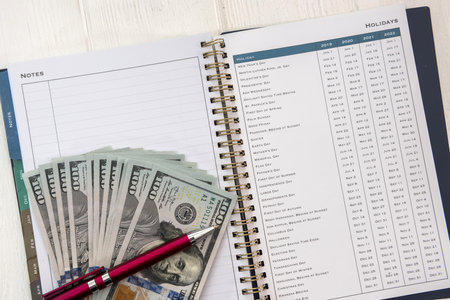 financial concept. dollar and empty notepad. cashの写真素材