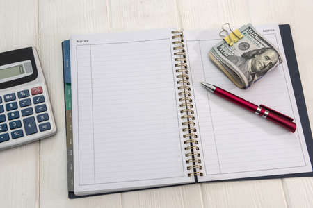 empty notepad and dollar with pen for design. business conceptの写真素材