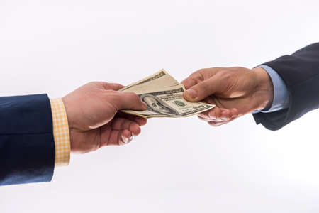 transfer money dollars in the hands isolated. finance conceptの写真素材