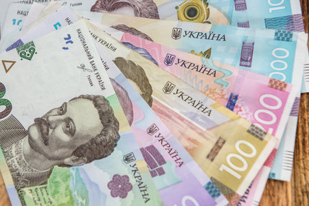 new ukraine money banknotes as background for design. uah cash