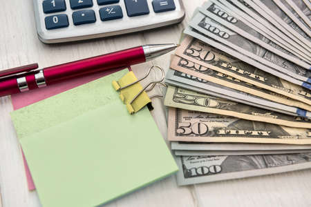 financial concept. dollar and empty notepad. cashの写真素材