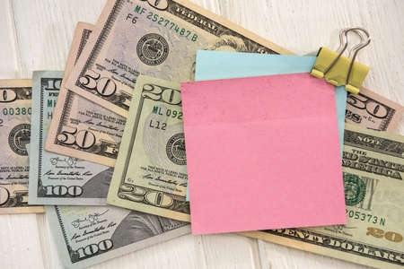 Empty memo for your text and money. blank with dollarsの写真素材