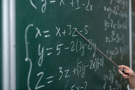 Schooling. Mathematical formulas are written on the blackboardの写真素材