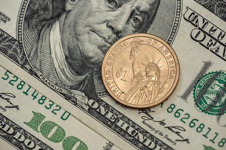 close up of dollars bills and us coins moneyの写真素材