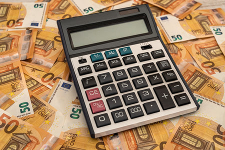 finance background concept euro bills with calculator. European moneyの写真素材
