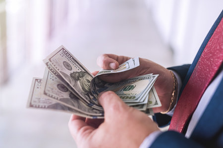 Ambitious business man in blue suit count us money. finance concept